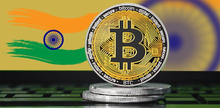 Bitcoin located at the centre with Indian flag as background illustration