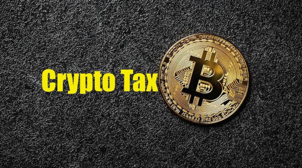 Bitcoin with yellow text as crypto tax